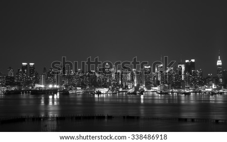 photo new york city skyline at night, midtown nyc