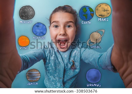 Teen girl making a self laughing mouth open planet of the solar system astronomy
