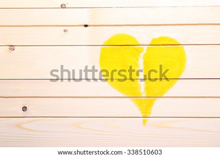 Heart painted on wooden wall