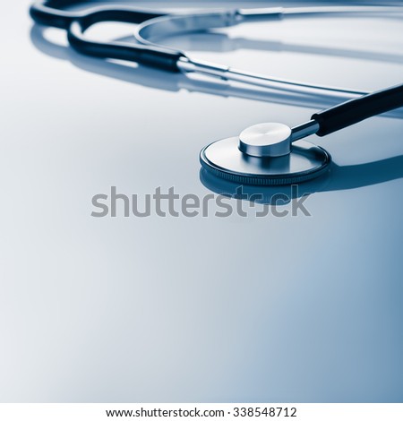 Medical concept image. Stethoscope seen from above.  A lot copy space around the product. Top view. Square image proportions.