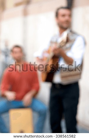 blurry picture of street singer