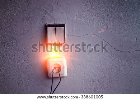 abandon wiring socket with short circuit Royalty-Free Stock Photo #338601005