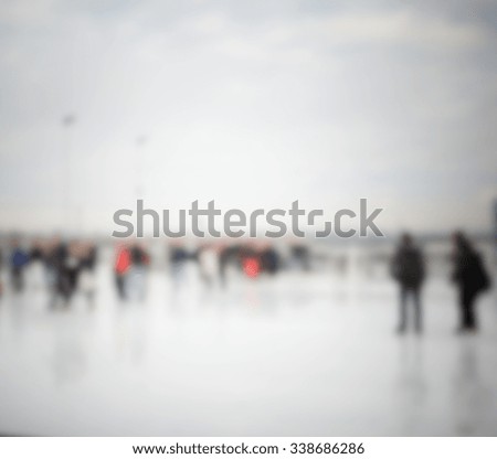 People at the station, background. Intentionally blurred post production.