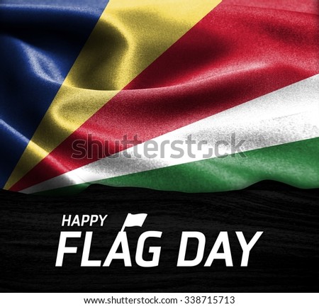 Happy Flag Day Typography Seychelles flag on wood Texture background
