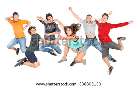 Group of happy teenagers jumping isolated in white