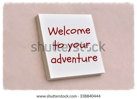 Text welcome to your adventure on the short note texture background
