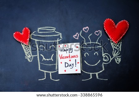 card Happy Valentine's Day with painted cups of coffee lying on the chalkboard. toning. selective Focus