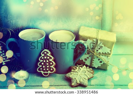 Cup of chocolate and gingerbread cookies. Christmas time.