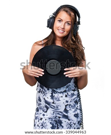 woman holding a vinyl