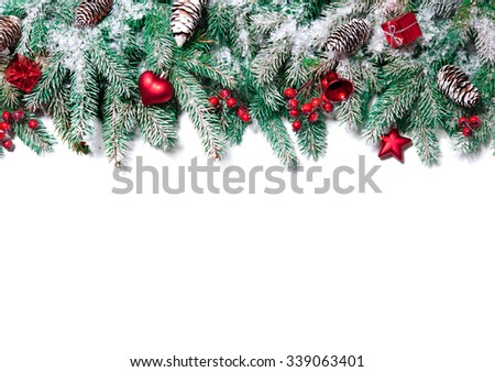 Christmas Border. Tree branches with baubles, stars, snowflakes isolated on white