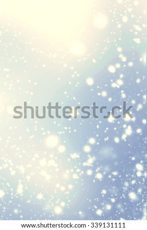 Beautiful abstract snowflake and stars Christmas background. Golden Lights on blue background.