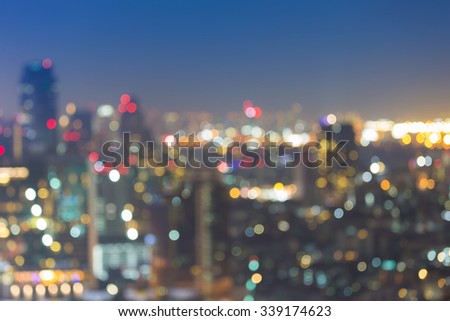 Blurred bokeh lights at night, city downtown background