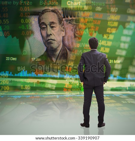 Businessman standing in front of concept of Japanese 10000 YEN on stock market ticker