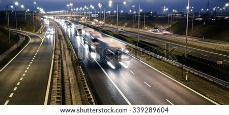 Four lane controlled-access highway in Poland.
 Royalty-Free Stock Photo #339289604