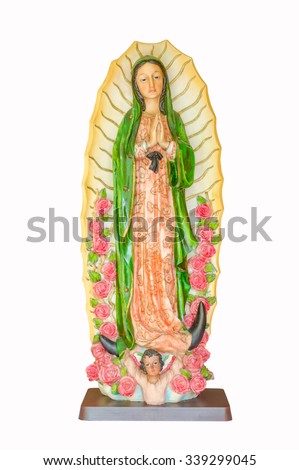 Our Lady Guadalupe statue with white background Royalty-Free Stock Photo #339299045