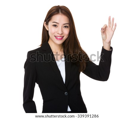Young Businesswoman with ok sign gesture
