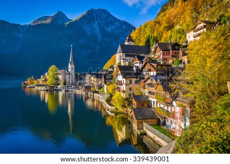 Scenic picture-postcard view of famous Hallstatt mountain village with Hallstatter See in the Austrian Alps in beautiful golden morning light in fall, region of Salzkammergut, Austria