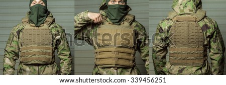 demonstration of body armor. bulletproof vest. unrecognizable man