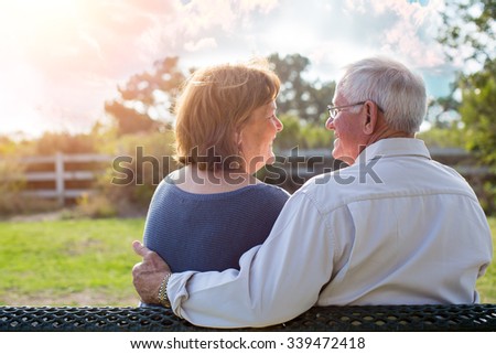Happy senior mature couple in love outside in nature