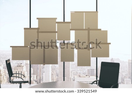 Blank paper posters on window of conference room with furniture, mock up