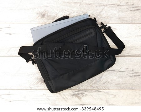 A studio photo of a laptop shoulder bag