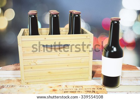 Case of beer and black bottle on wooden table, mock up
