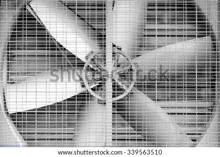 Big fan in the factory background Royalty-Free Stock Photo #339563510