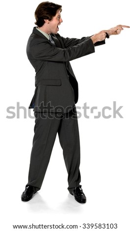 Excited Caucasian man with short dark brown hair in business formal outfit pointing using finger - Isolated