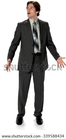 Shocked Caucasian man with short dark brown hair in business formal outfit with arms open - Isolated