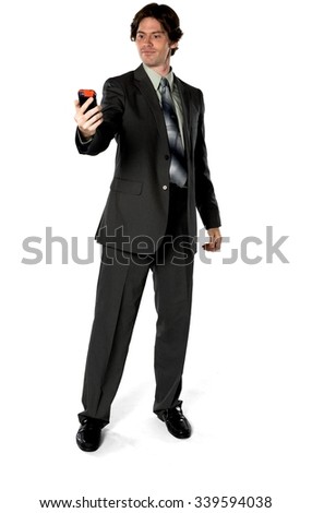 Serious Caucasian man with short dark brown hair in business formal outfit using mobile phone - Isolated