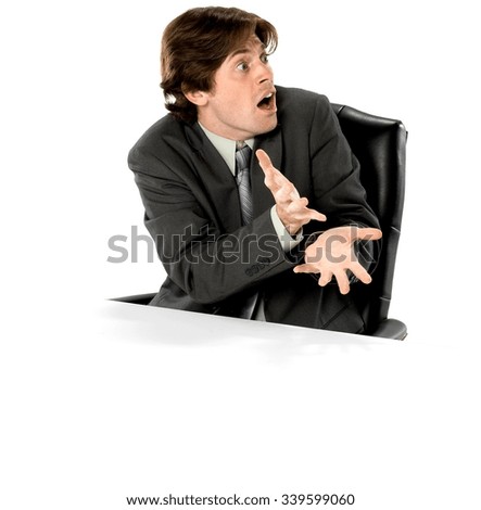 Shocked Caucasian man with short dark brown hair in business formal outfit talking with hands - Isolated