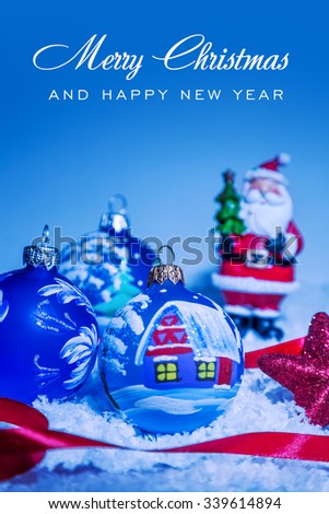 Christmas balls and snowflake on blue background