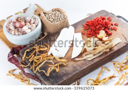 Still life of asia seasoning on white - Set of Chinese herb for making original Chinese soup