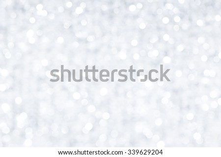 silver and white bokeh lights defocused. abstract background