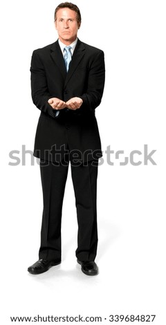 Sad Caucasian man with short medium blond hair in business formal outfit holding invisible object - Isolated