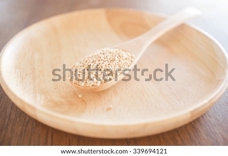Raw organic white quinoa seeds, stock photo