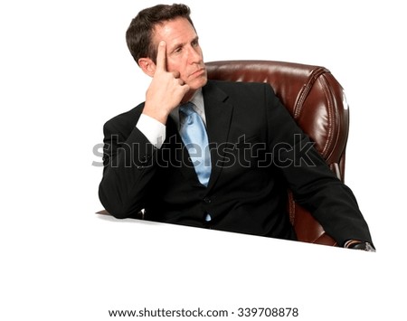 Serious Caucasian man with short black hair in business formal outfit with hands on face - Isolated