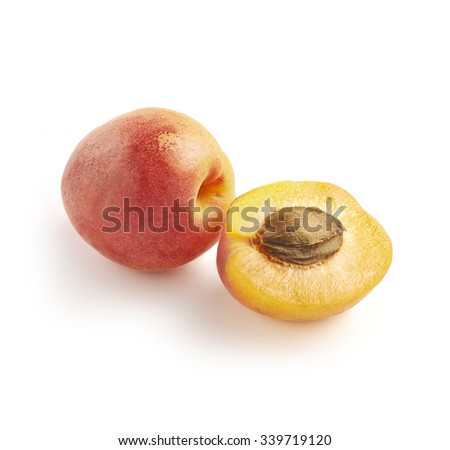 High Angle Still Life View of Whole Ripe Nectarine and Half Nectarine with Stone Pit on White Background with Copy Space in Square Image Format