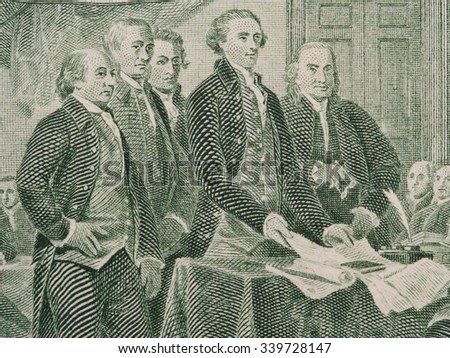 Signing  declaration of independence from us two dollar bill macro, united states money closeup Royalty-Free Stock Photo #339728147