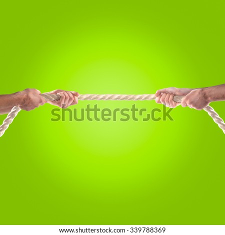Hands of people pulling the rope. Competition concept