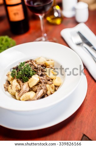 Traditional Italian dishes - gnocchi with duck