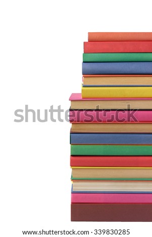 Pile of books with covers of different colors on a white background, isolate.