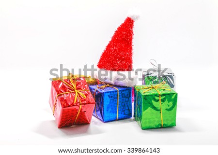 Gift box and santa hat on white background. colorful gifts box.
