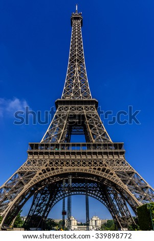 Tour Eiffel (Eiffel Tower) located on Champ de Mars in Paris, named after engineer Gustave Eiffel. Eiffel Tower is tallest structure in Paris and most visited monument in the world. France.