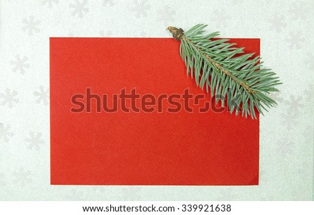 chritmas card with fir on silver snowflakes background