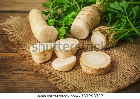 raw and choped parsley root Royalty-Free Stock Photo #339963332
