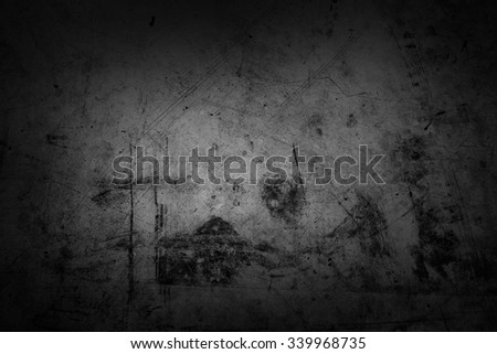 Dark grunge textured wall closeup 