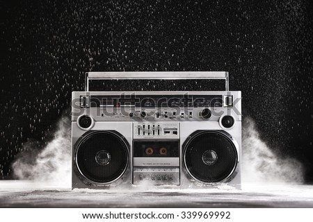 1980s Silver Retro ghetto blaster and dust isolated on black background with clipping path Royalty-Free Stock Photo #339969992