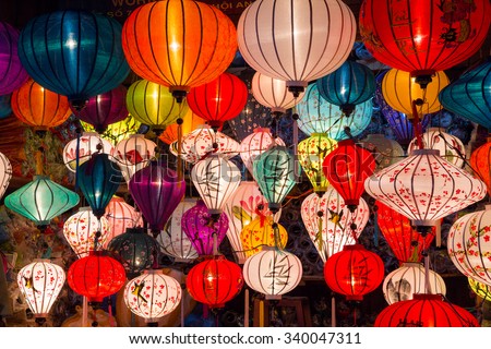 Paper lanterns on the streets of old Asian town Royalty-Free Stock Photo #340047311