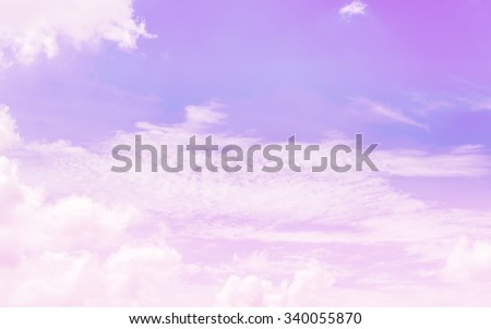  Soft blurred of  cloud background with a pastel colored orange to blue gradient.